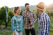 © NDABCREATIVITY - People tasting wine in vineyard