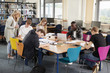 © Monkey Business - Busy College Library With Teacher Helping Students At Table