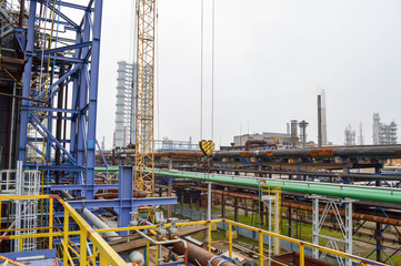 Wall Mural - Construction in an oil refinery. Petrochemical plant.