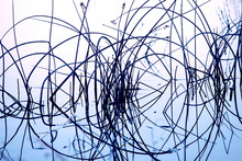 Blue Tone Abstract Created By Reflection Of Reeds In Water