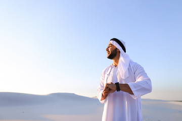 Wall Mural - Portrait of handsome Arab businessman who experiencing new iWatc