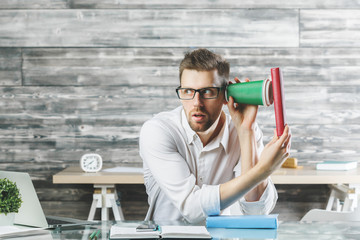 Canvas Print - Weird european suspicious businessman at workplace