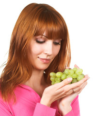 young woman with green grape