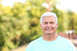 © Africa Studio - Handsome mature man in park