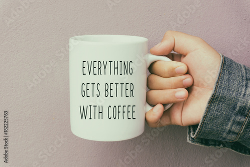 Cuadros en Lienzo Hands Holding a Coffee Mug With Text Quote - Everything Gets Better With Coffee