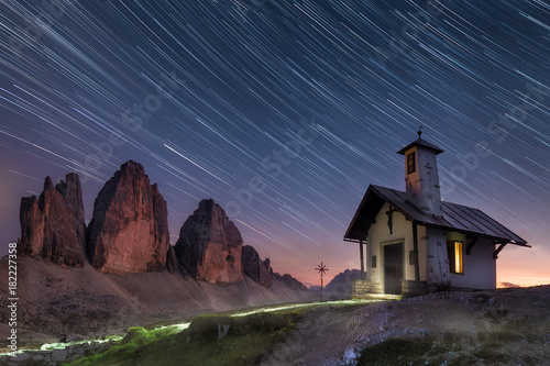 cool chapel in front of the tre cime di lavaredo in the dolomites south tyrol Canvas