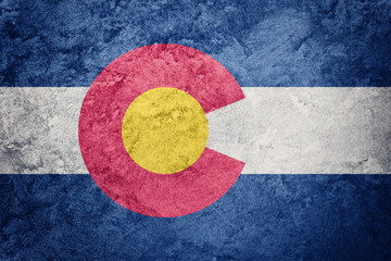 grunge colorado state flag. colorado flag background grunge texture.