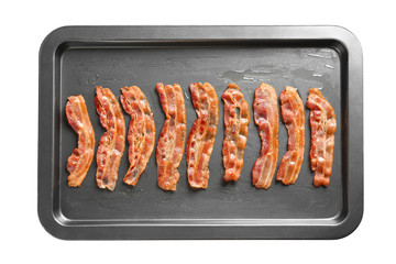 Wall Mural - Baking tray with cooked bacon rashers, isolated on white