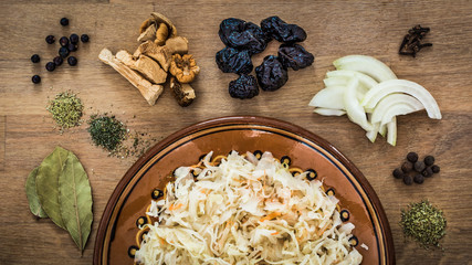 Ingredients of vegetarian bigos - traditional polish christmas eve dinner dish made of sauerkraut