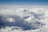 Fototapeta Niebo - Above the clouds. White clouds.