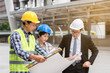 © paulfourk - engineering construction concept : professional engineer team meeting foreman group plan manufacturing industry