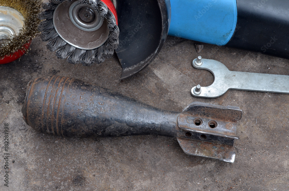 Soviet 50-mm mortar shell of WWII.Cleanining,deactivating and preparing ...