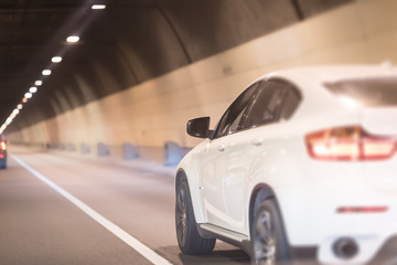 Car Driving On Highway at a Fast Speed in a Tunnel