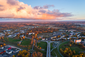 Aerial view of the city at sunset. Beautiful autumn city landscape.