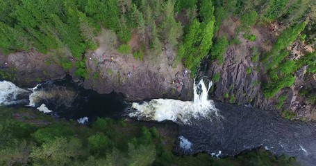 Wall Mural - Top view at the Suna river stream channel with plain waterfall the Kivach in rocks. The Kivach is national park and reserve in Karelia, northern Russia