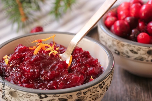 Fotografie, Obraz Homemade Cranberry Sauce served in a bowl on festive background