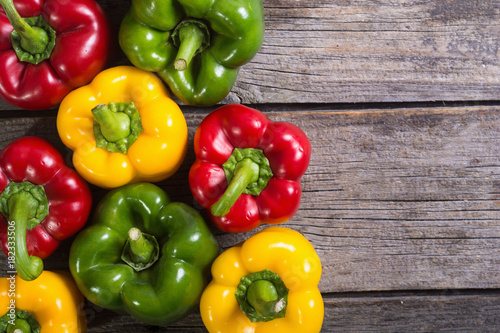 Cuadros en Lienzo Colorful green , red and yellow peppers