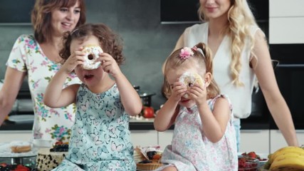 Wall Mural - Charming women baking with joyful children