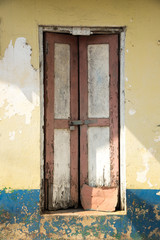 details of old wooden door in a in a countryside village