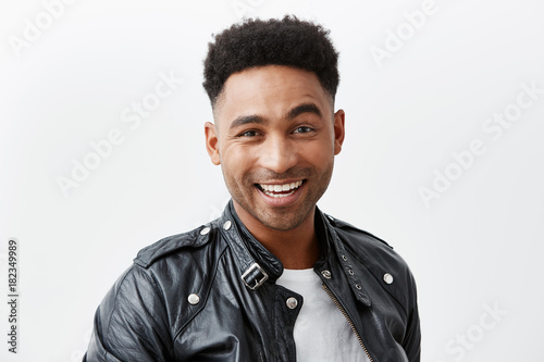 Close Up Portrait Of Young Cheerful Dark Skinned American Man With