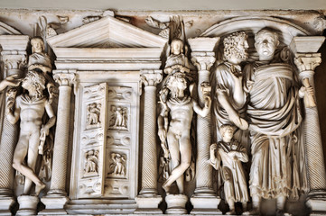 Wall Mural - Bas-relief and sculpture details in stone of Roman Gods and Emperors