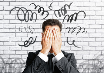 Poster - Stressed man covering face