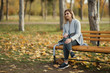 © tol_u4f - young beautiful woman in park. Autumn background
