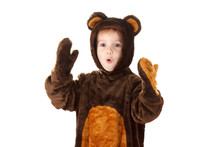 Child In A Christmas Carnival Bear Costume Isolated On White