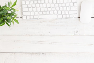 Wall Mural - flat lay photo of office desk with mouse and keyboard on white table wood,copy space and top view
