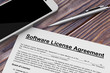 Software License Agreement with Mobile Phone and Pen. 3d Rendering
