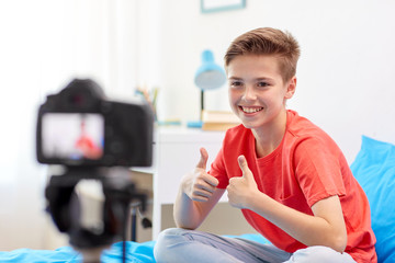 Sticker - happy boy with camera recording video at home