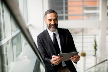 Businessman with tablet in the office