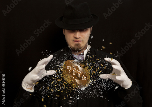 Fotografía Magician working. Gold bitcoin coin