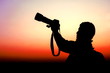© TANIDA - silhouette photographer taking photo of sunset light
