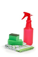Wall Mural - Detergent spray bottle, scouring pad and napkin cloth on white