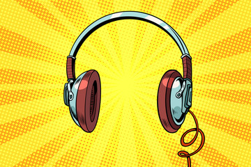 Retro headphones on a yellow background