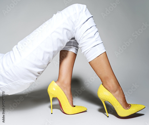Part of women legs in beautiful fashionable high heels Poster Mural XXL