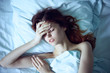 © SHOTPRIME STUDIO - Woman lies in bed, bedroom, rest, headache, portrait, morning