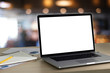 © onephoto - Laptop with blank screen on table. Workspace background new project on laptop computer with blank copy space screen for your advertising text message