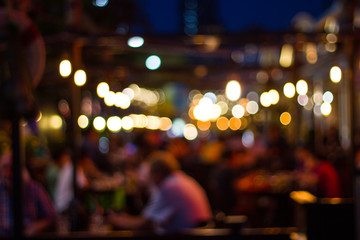 Wall Mural - abstract blur image of night festival in a restaurant and The atmosphere is happy and relaxing with bokeh for background