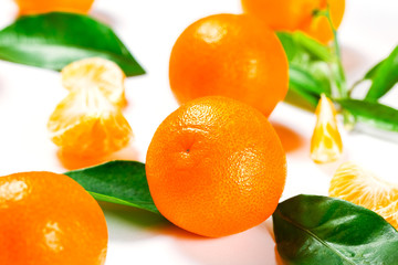 Ripe Orange Tangerine (Mandarin) With Leaves Close-up On The White Background.