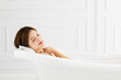 © Tom Wang - young Beautiful woman relaxing in bathtub