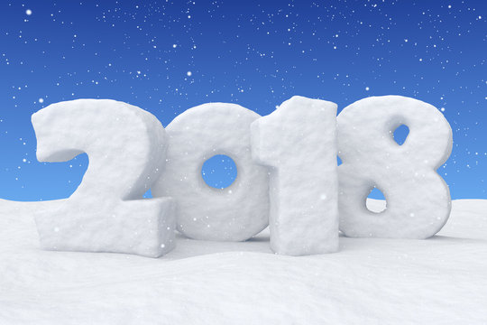 New Year 2018 snow text on snow under blue sky with snowfall