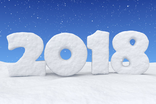 2018 New Year snow text on snow under blue sky and snowfall