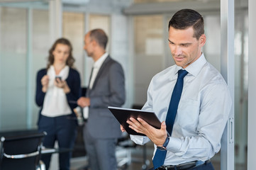 Businessman using tablet