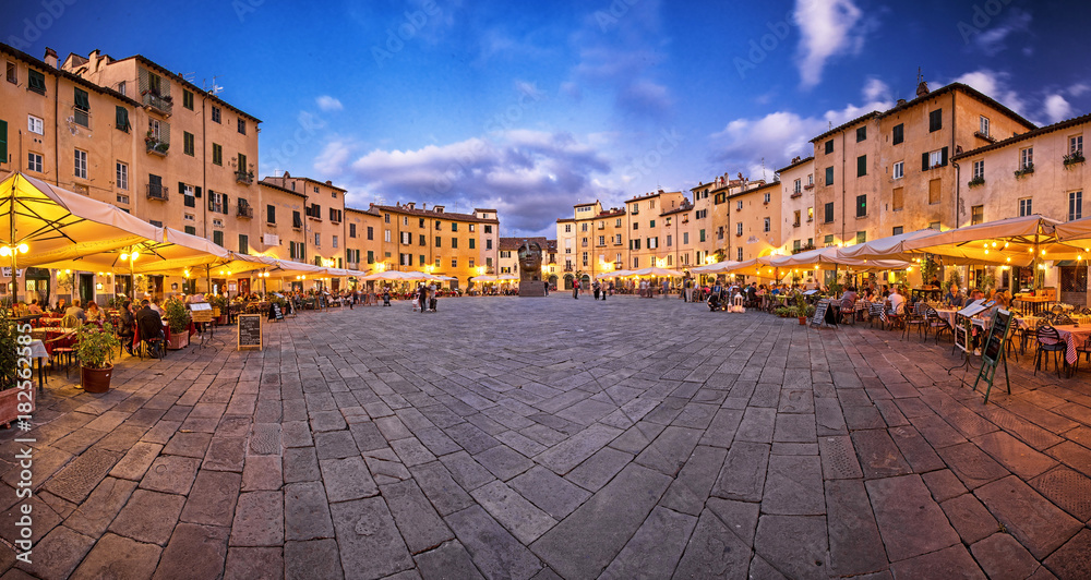 Famous Piazza Anfiteatro in Lucca, Italy - obrazy, fototapety, plakaty 