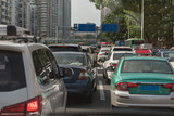 Fototapeta  - traffic jam on main street with row of cars