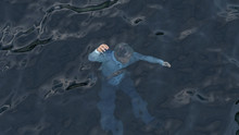 Man Sinking In The Sea
