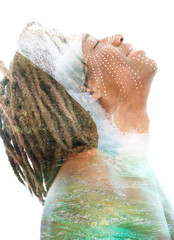 Wall Mural - Double exposure of a dark skinned man with dreadlocks laughing, combined with a photograph of a beautiful crystal clean waterfall