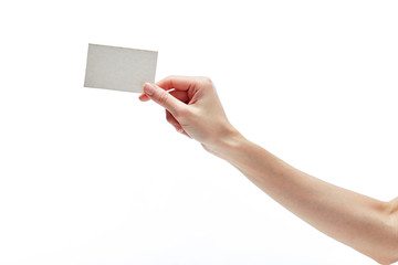 Female hand holding card